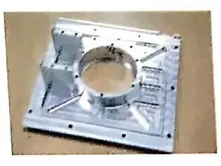 4-axis CNC machined plate with pockets and slots