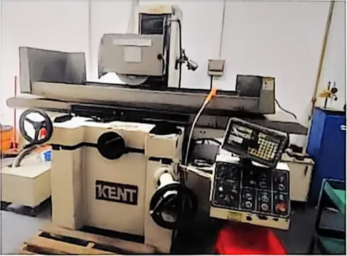 large surface grinder in the tool shop